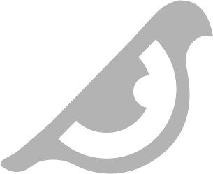 Close-up of a gray fishing knife with a white ball in the handle, photographed against a black background.