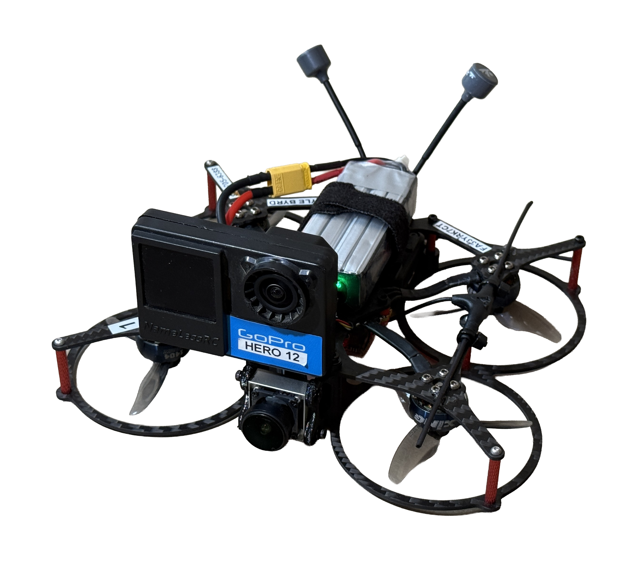 Close-up of a drone with a GoPro Hero 12 camera attached, showing parts of the drone's frame, motor, wiring, and camera mount.