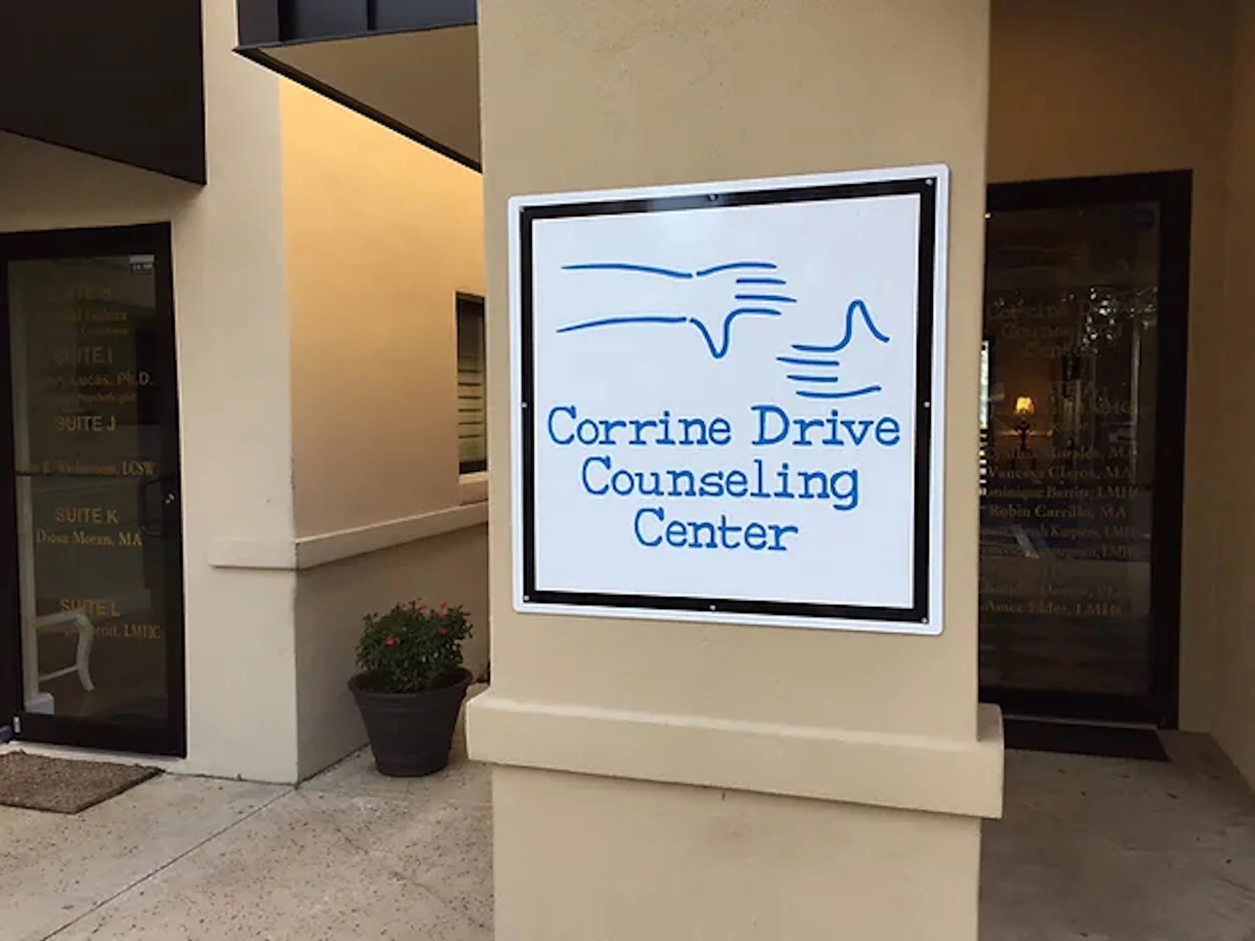 a sign that reads "Corrine Drive Counseling Center"