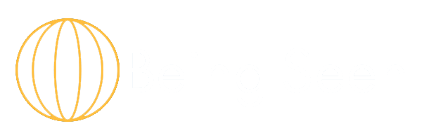 Logo with orange globe icon and the text 'Being Seen' on a black background.