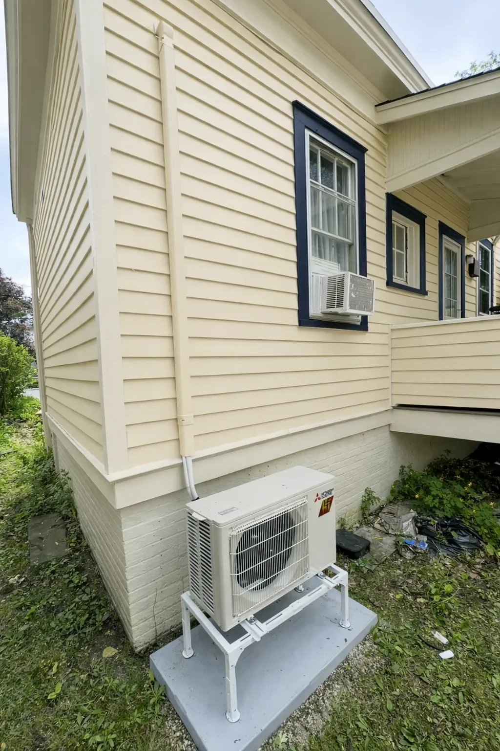 Mitsubishi Electric mini-split condenser installed on a home in the Hudson Valley NY by AeroDrop Service Providers