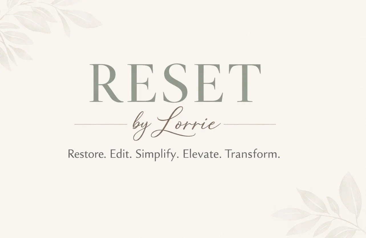 The image shows a light-colored background with subtle leaf designs in opposite corners. In the center, there is a text that reads 'RESET by Lorrie' with a subtitle 'Restore. Edit. Simplify. Elevate. Transform.'