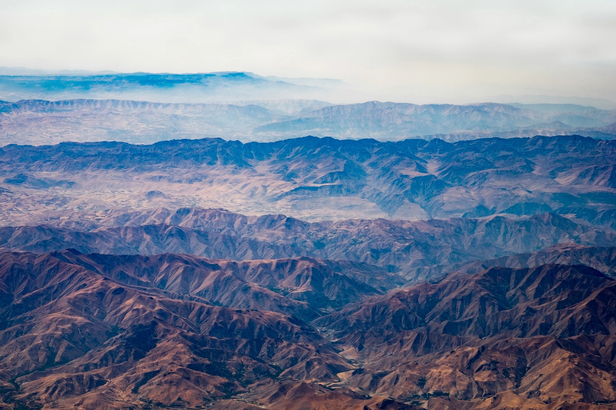Geometric drawing of an outline square with sections divided by vertical, horizontal, and half circle lines.
