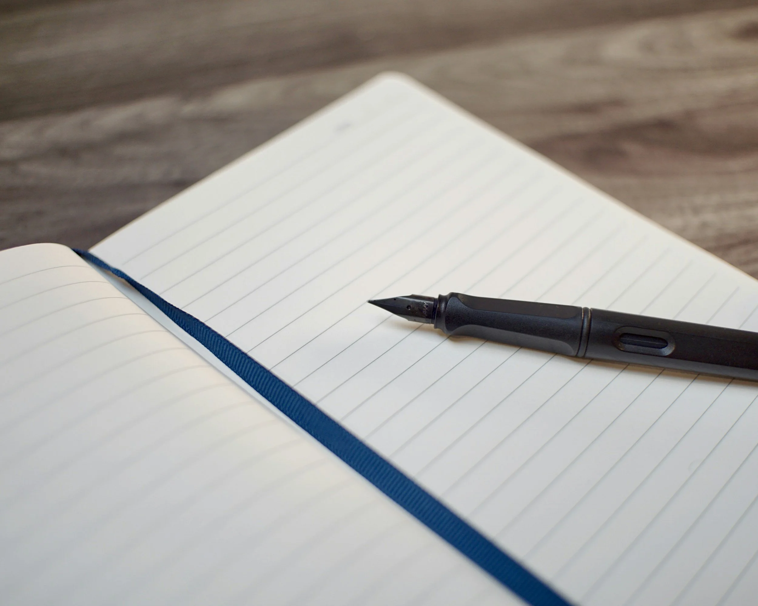 A blank page with a pen