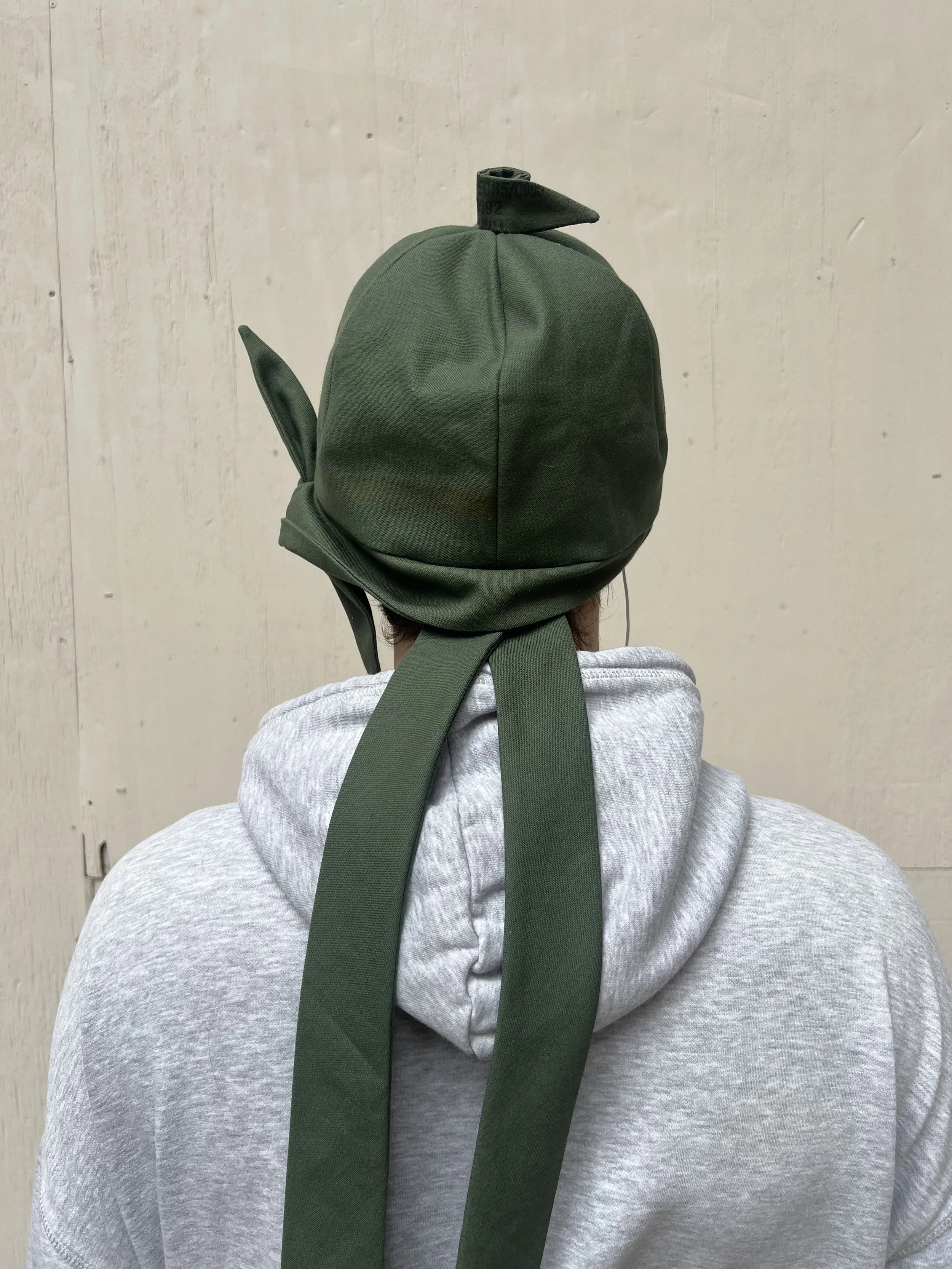 Horse jockey helmet inspired military cap.