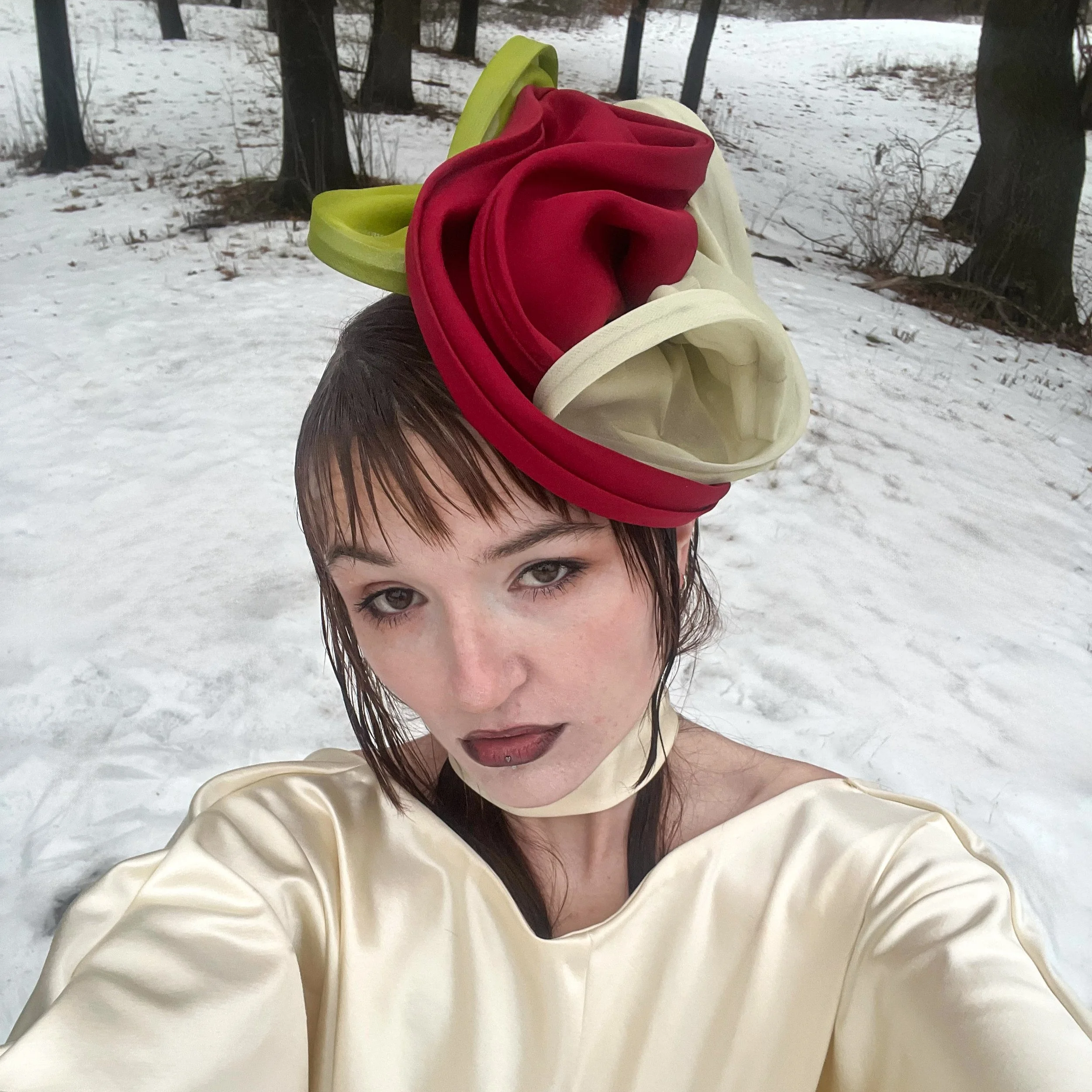 Matching fascinator cocktail headpiece and self fabric silk neck scarf.