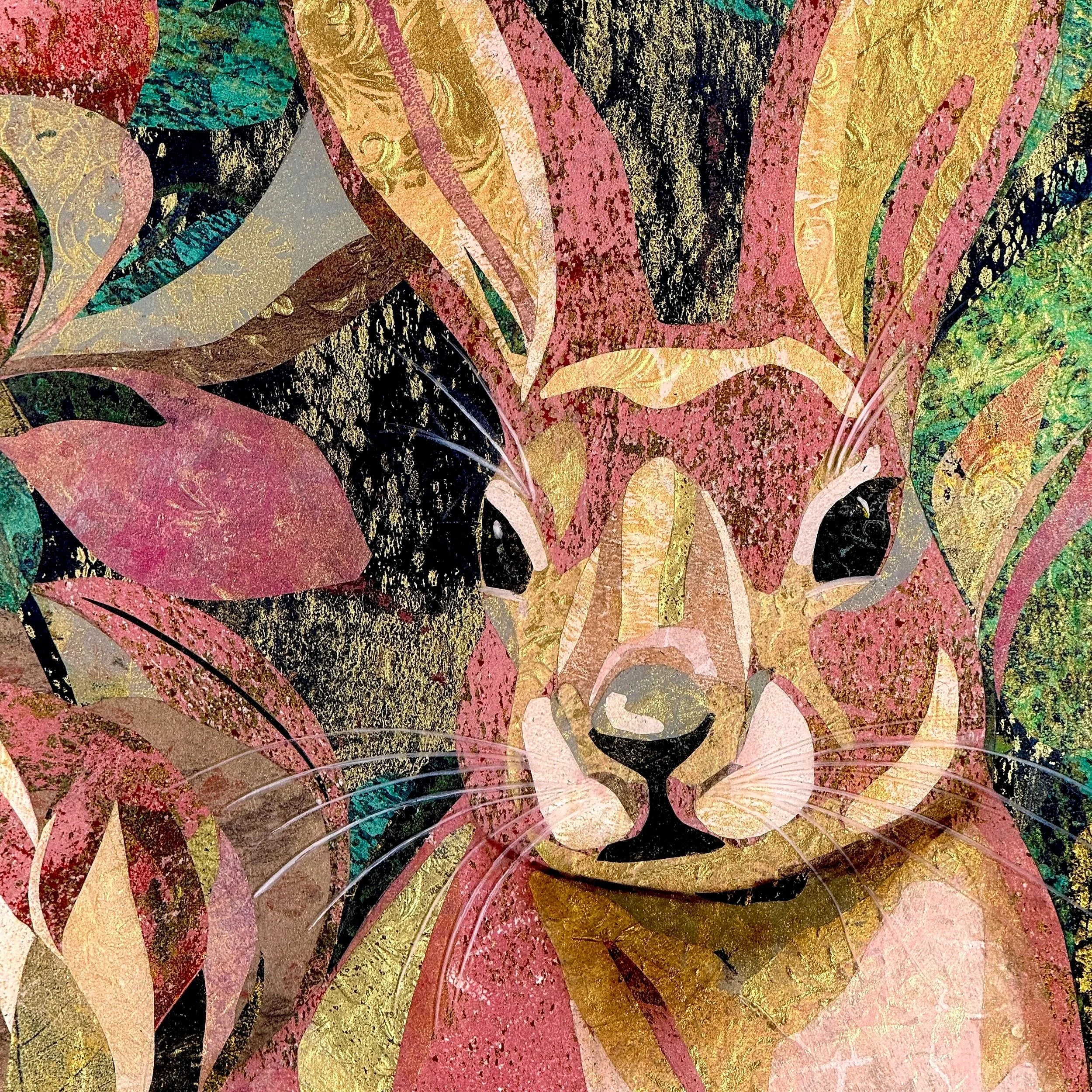close up of pink rabbit collage wall art.jpg