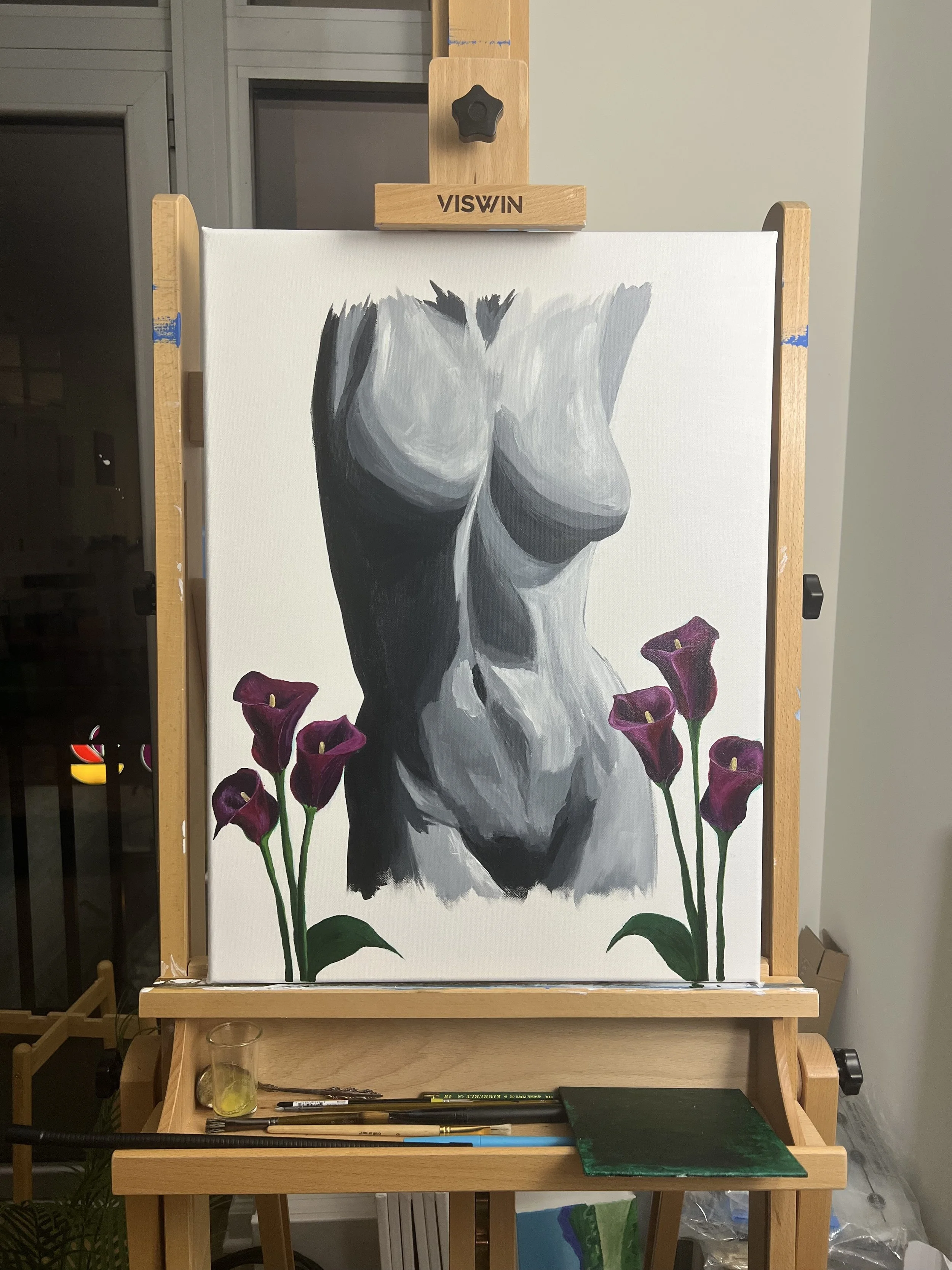 calla lilies on easel.jpg