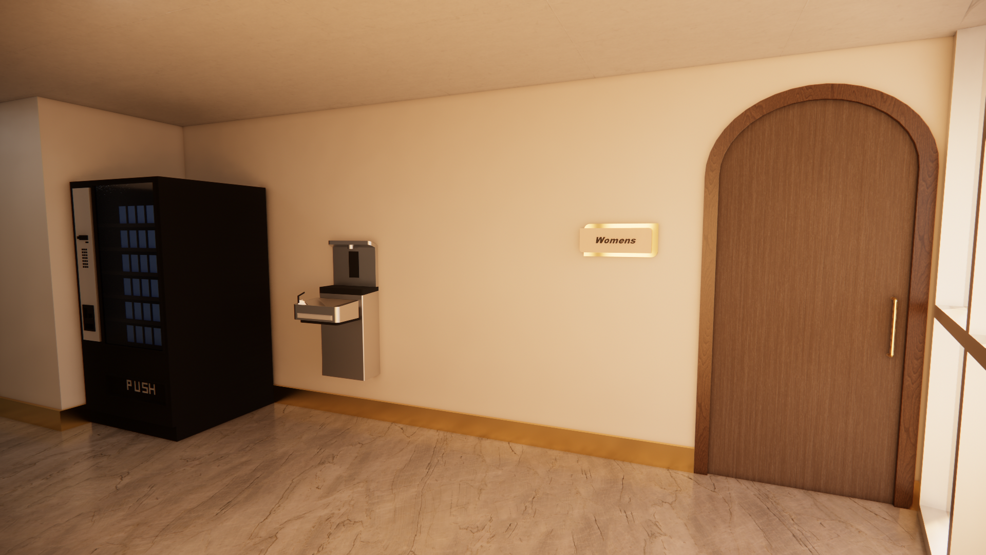 Indoor hallway leading to women's bathroom, with a vending machine, a water fountain, and a sign on the wall that says 'Womens'.