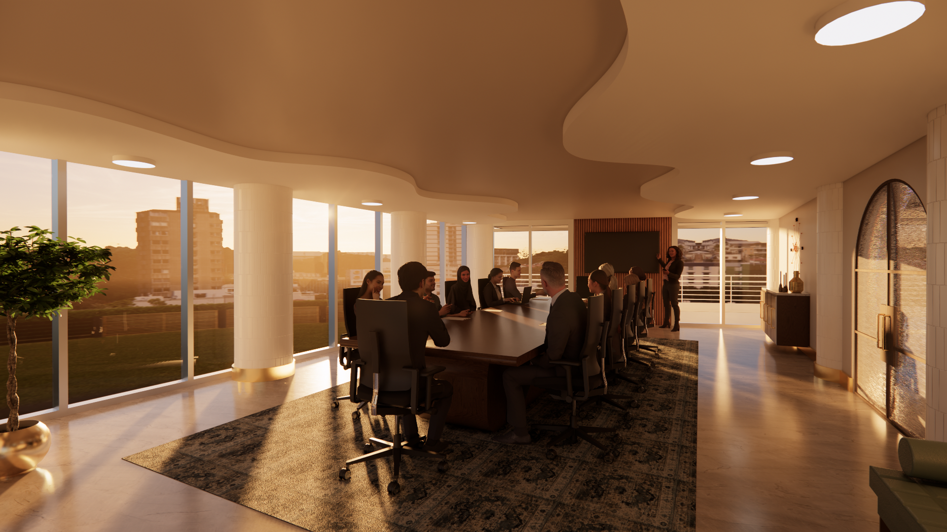 Business conference room with large windows, a long table surrounded by people in business attire, and a presenter standing at the front near a blackboard, during sunset.