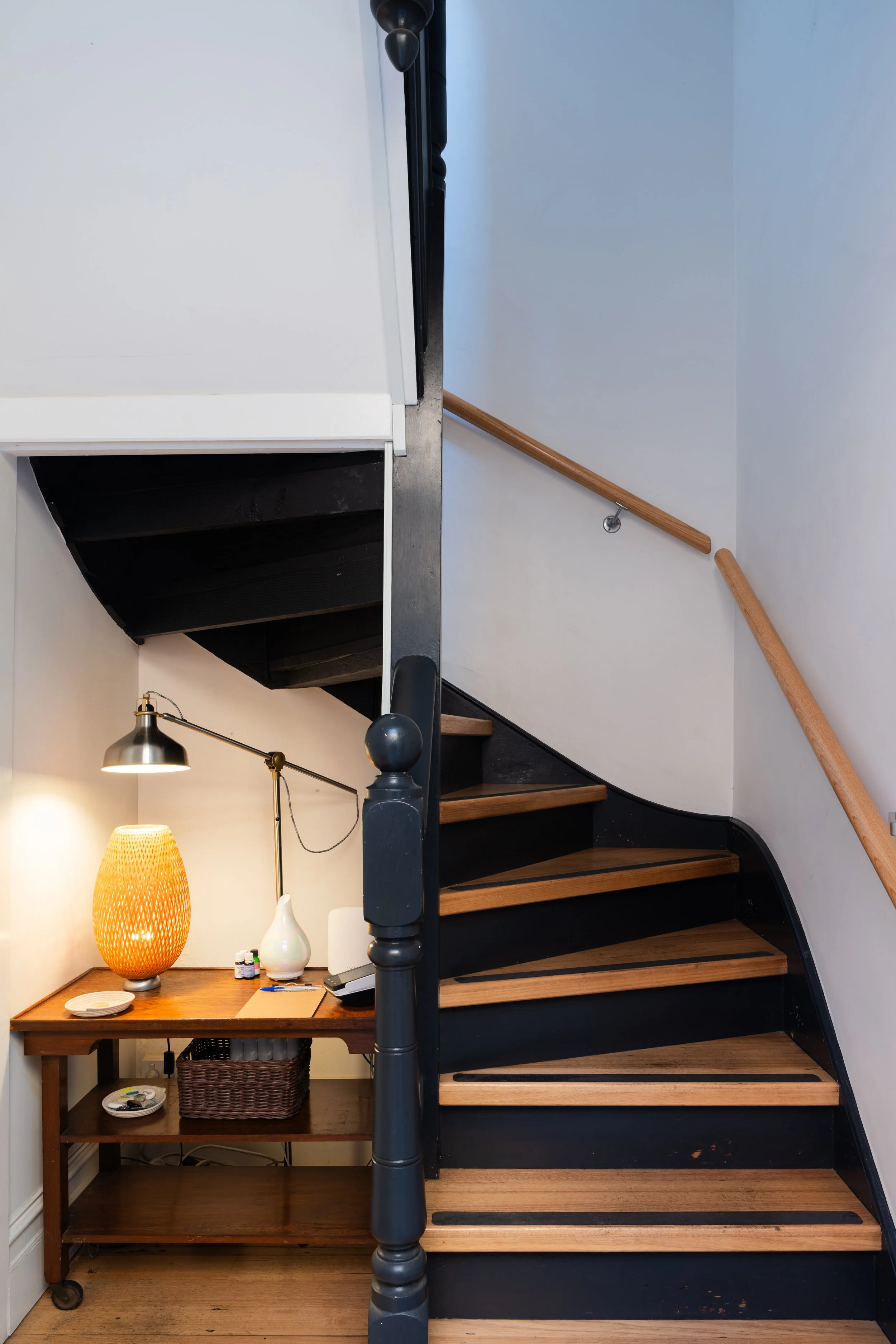 Warm staircase and reading nook inside Four Seasons Wellness Centre, Abbotsford Melbourne