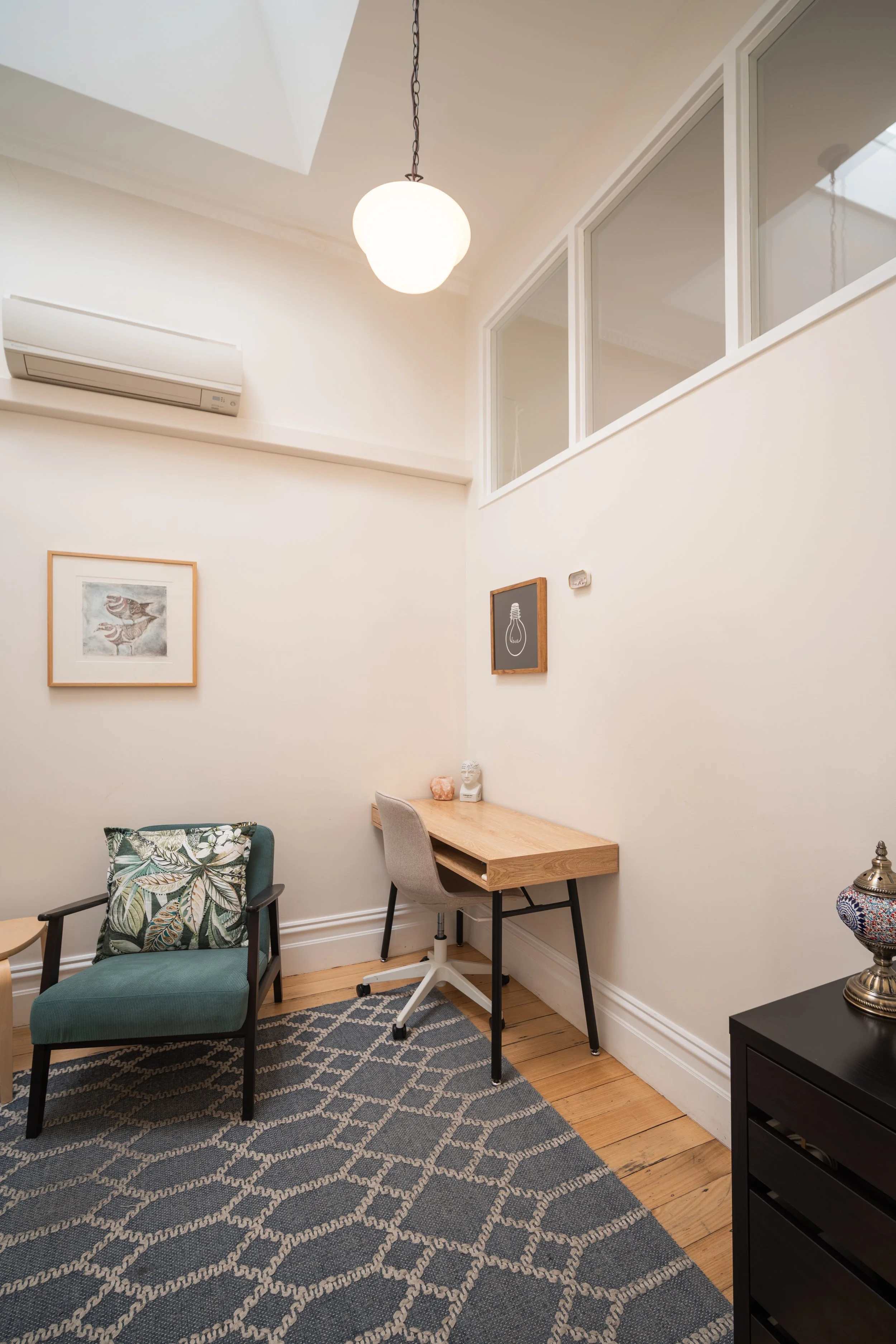 Light-filled therapy room with treatment table at Four Seasons Wellness Centre Abbotsford Melbourne