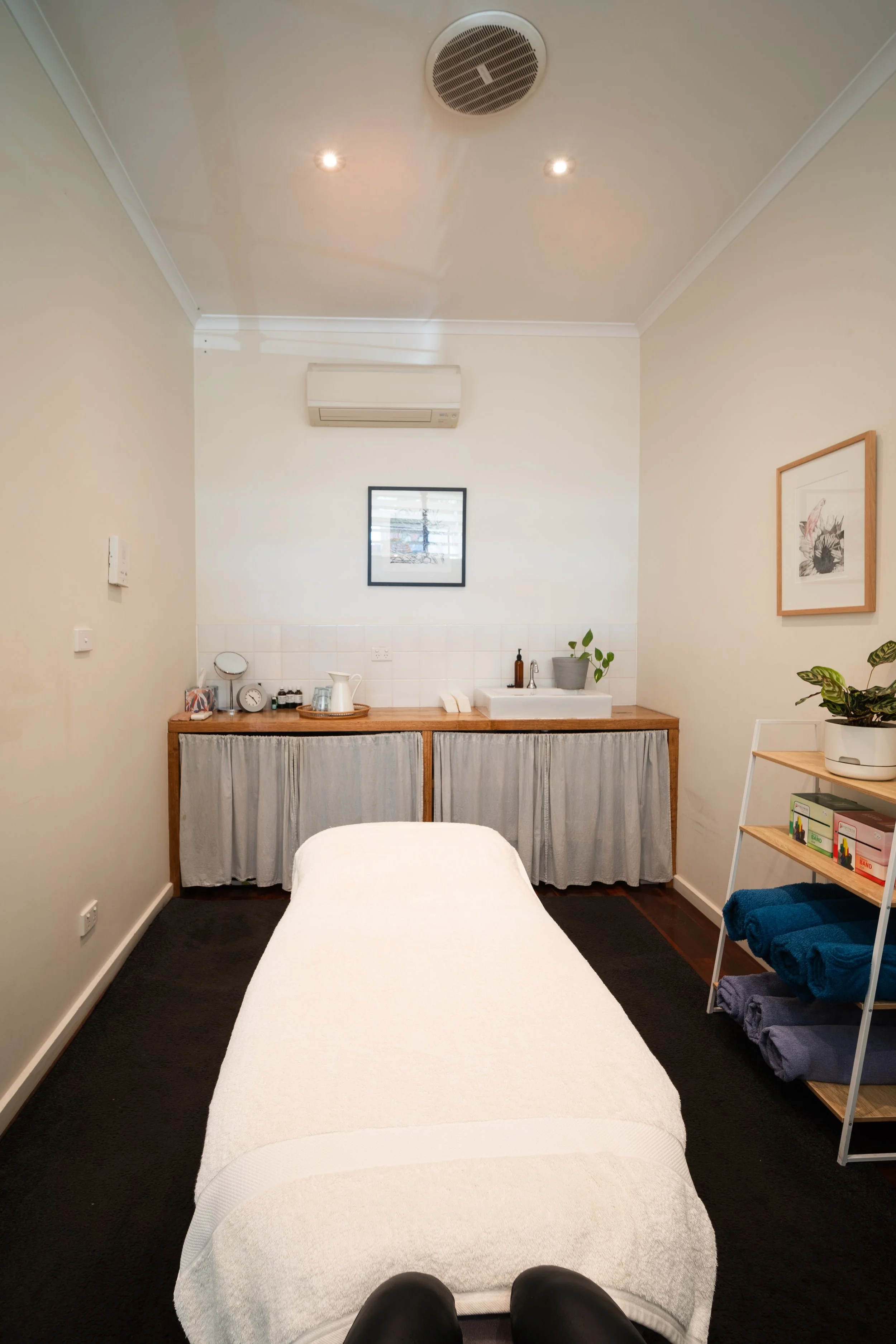Minimal therapy room with massage table at Four Seasons Wellness Centre Abbotsford Melbourne