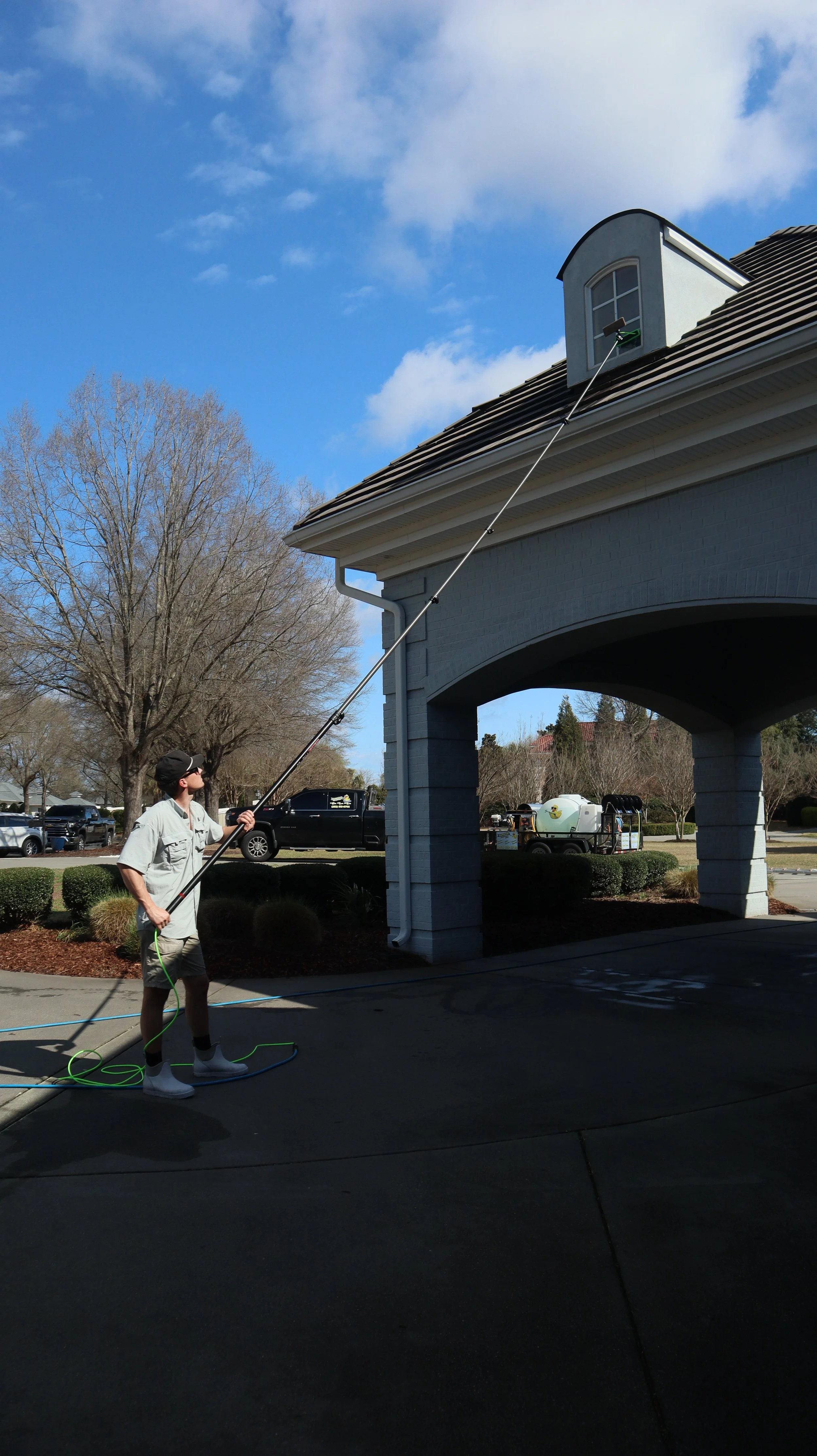 cody cleans it power washing a leage residential home 
