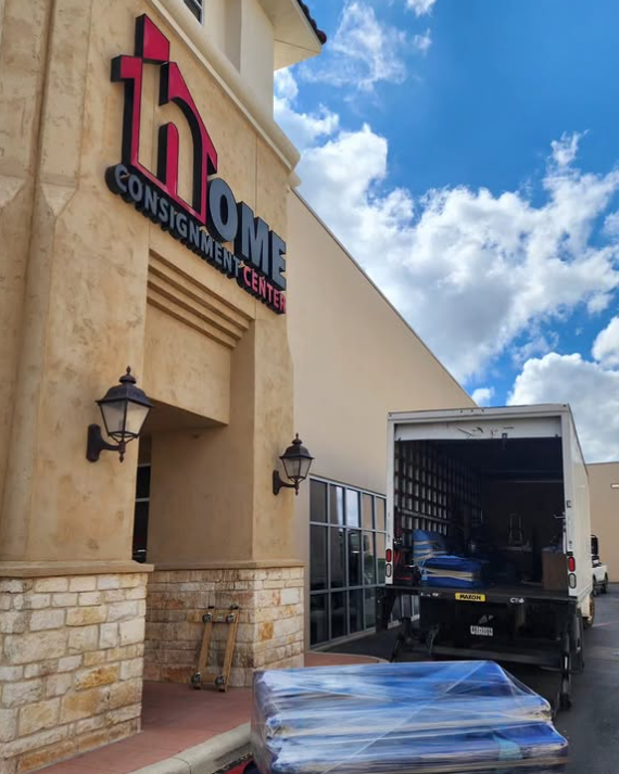 Furniture delivery service handling large item delivery for a residential customer.
