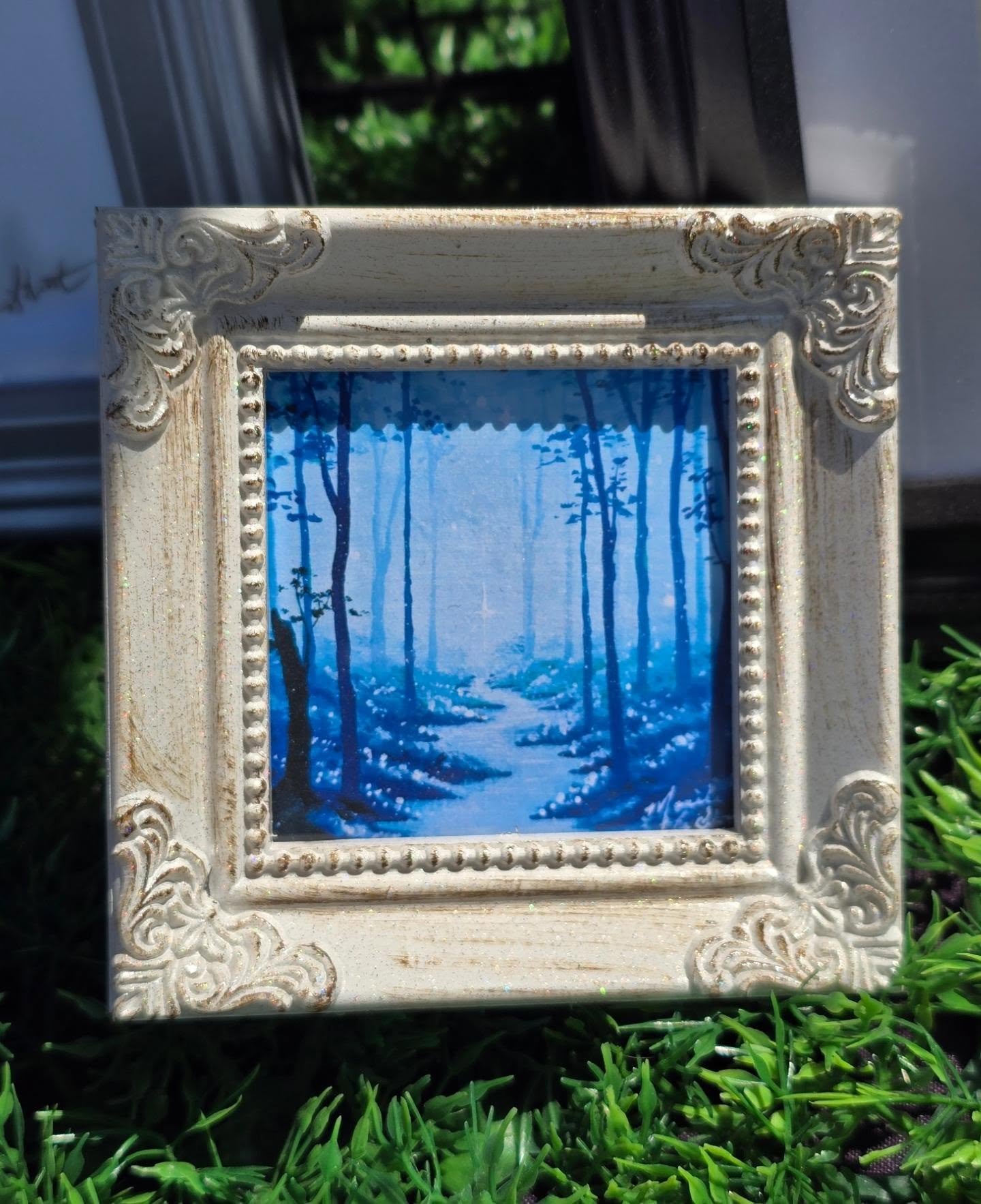 I have all kinds of whimsical little handmade miniatures for sale; to take you away somewhere soft and dreamy 💜🌿🦋🌳🧚🏻&zwj;♀️ 

Mini art lockets, canvas on easels, framed fine art prints, magnetic art, handmade frames &amp; more

My minis are cur