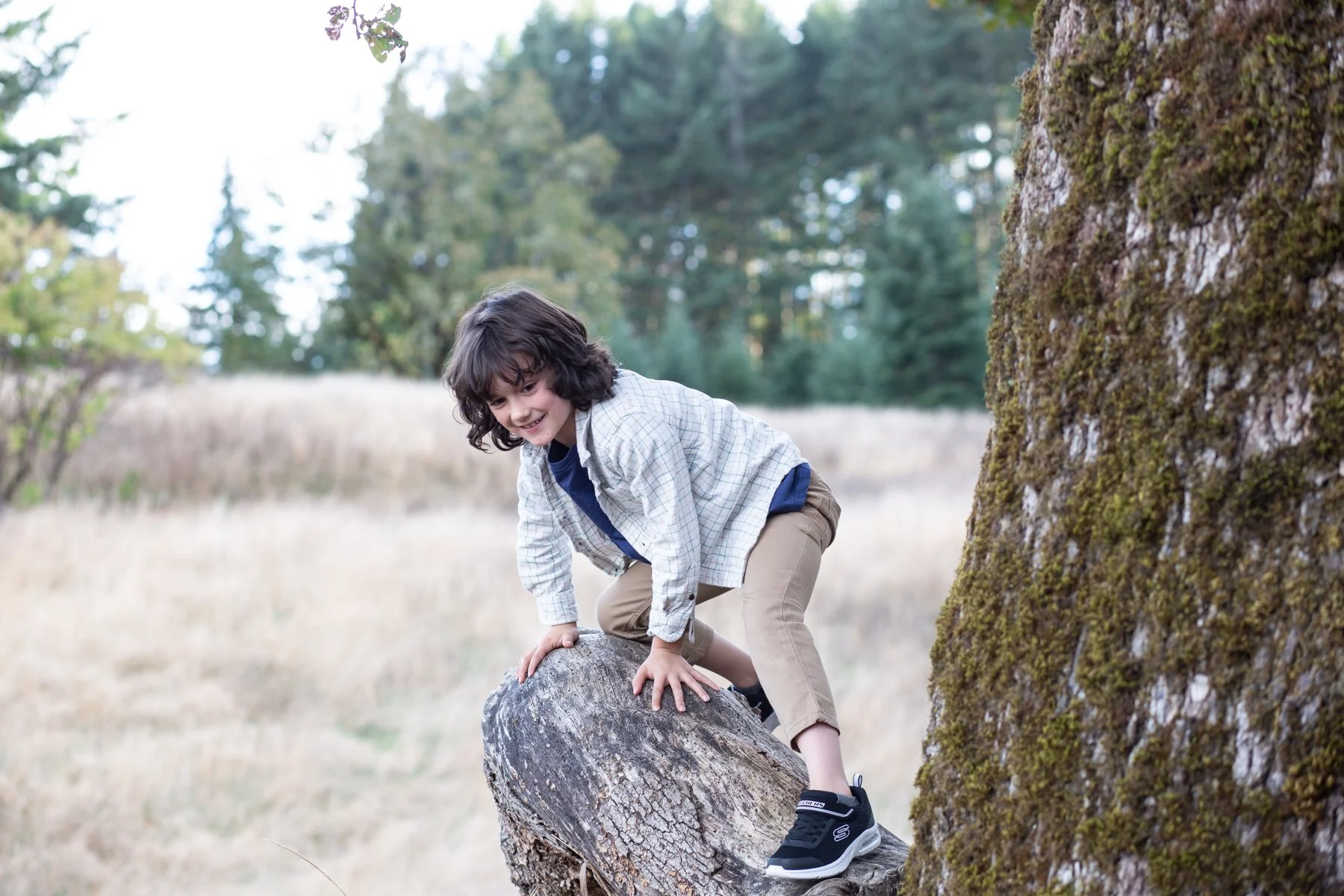 Kid in a candid moment during an outdoor portrait session in Yamhill County