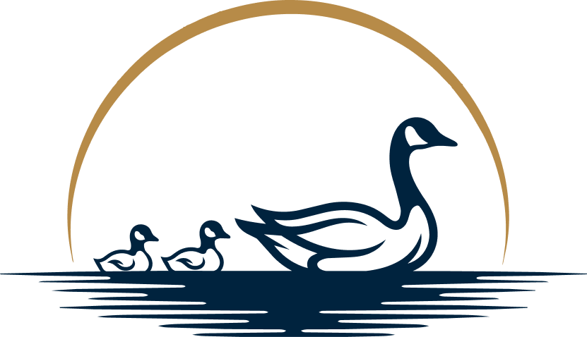 Silhouette of a mother duck leading her three ducklings across water, with a golden semi-circle suggesting the sun in the background.