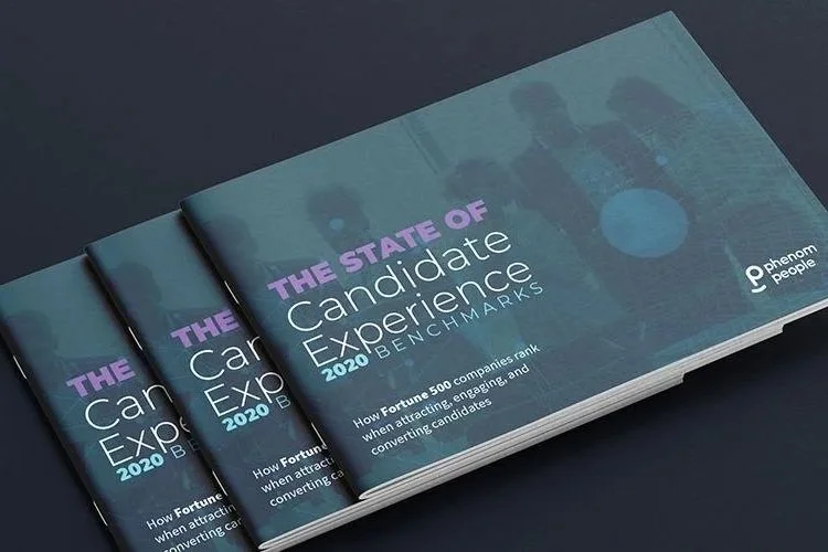 Three copies of a report titled 'The State of Candidate Experience 2020 Benchmarks' on a dark surface, with the top report slightly askew. This report powered earned media coverage in Derek Herman's PR strategy.