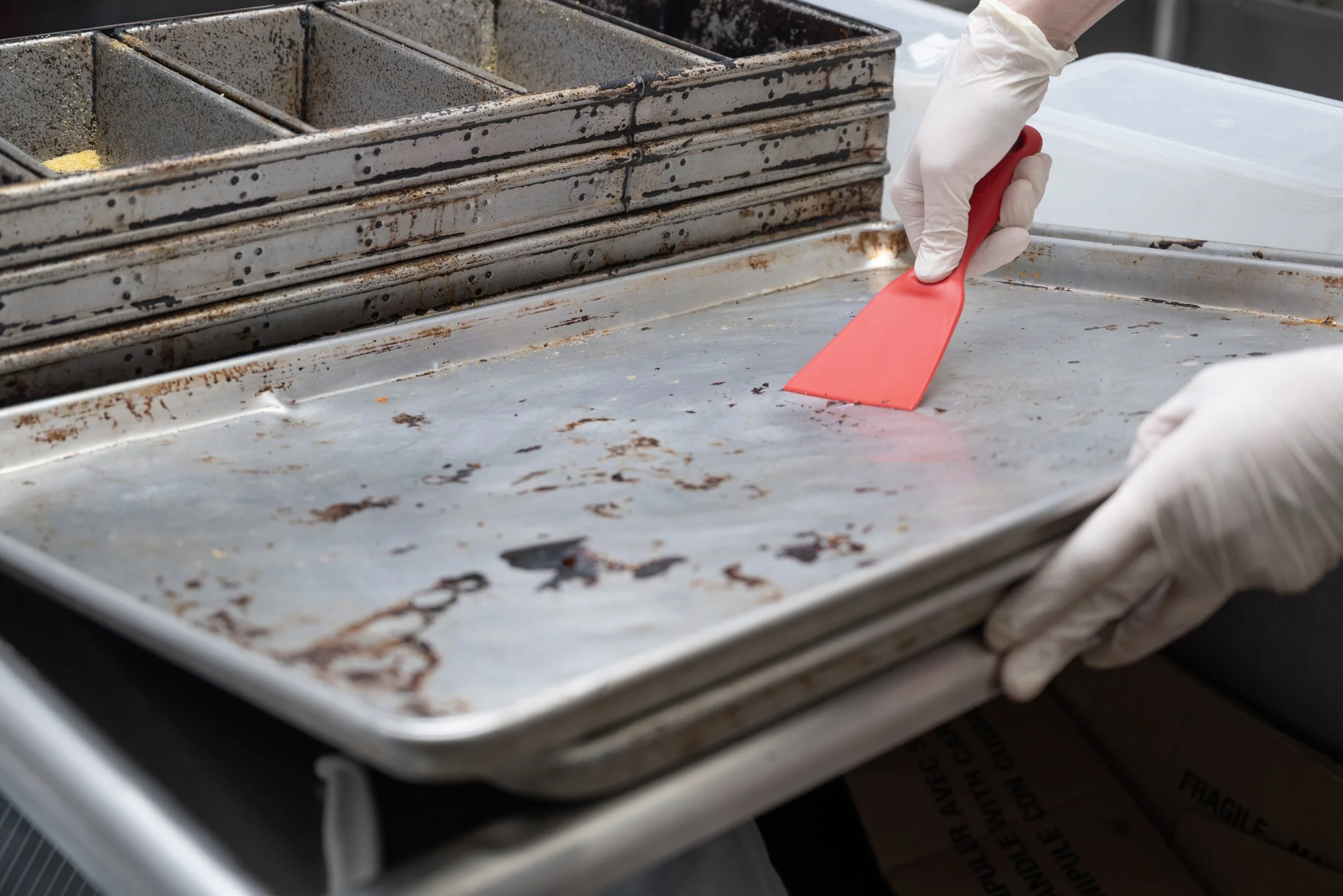 Red hand scraper