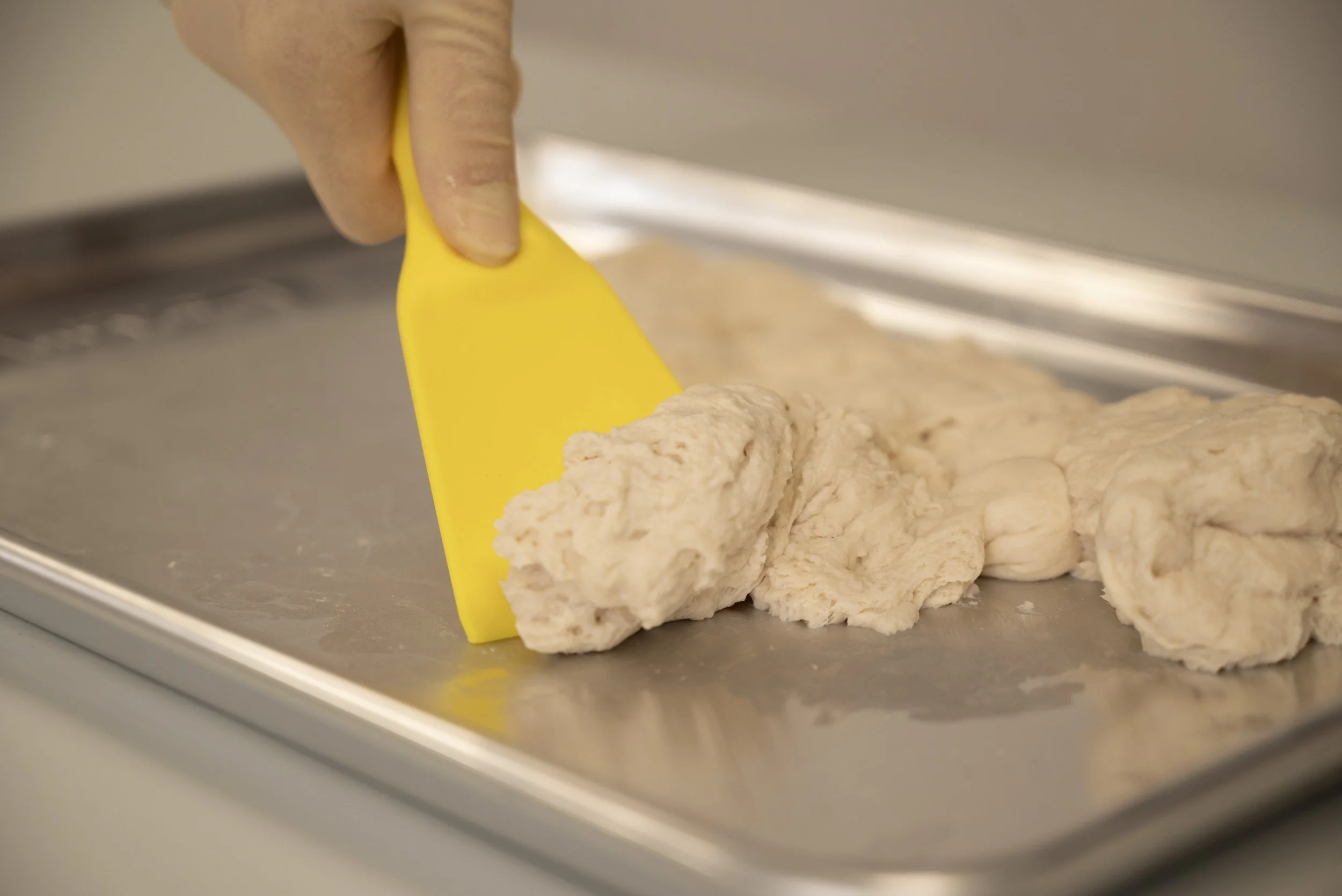 Yellow hand scraper