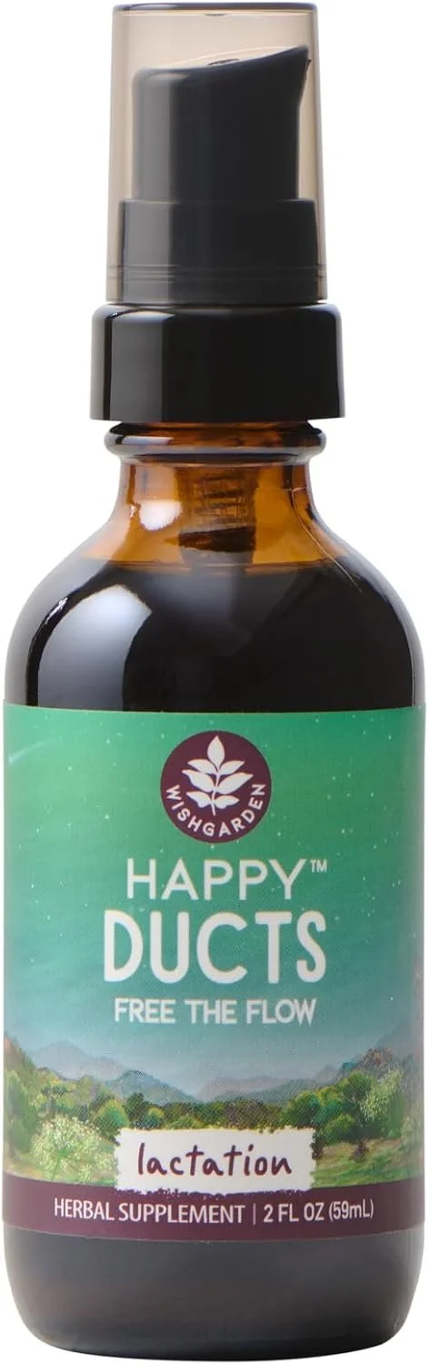 A small amber glass bottle with a black pump dispenser labeled 'Happy Ducts' herbal supplement, with a green landscape background and a white label with purple text that says 'lactation'.
