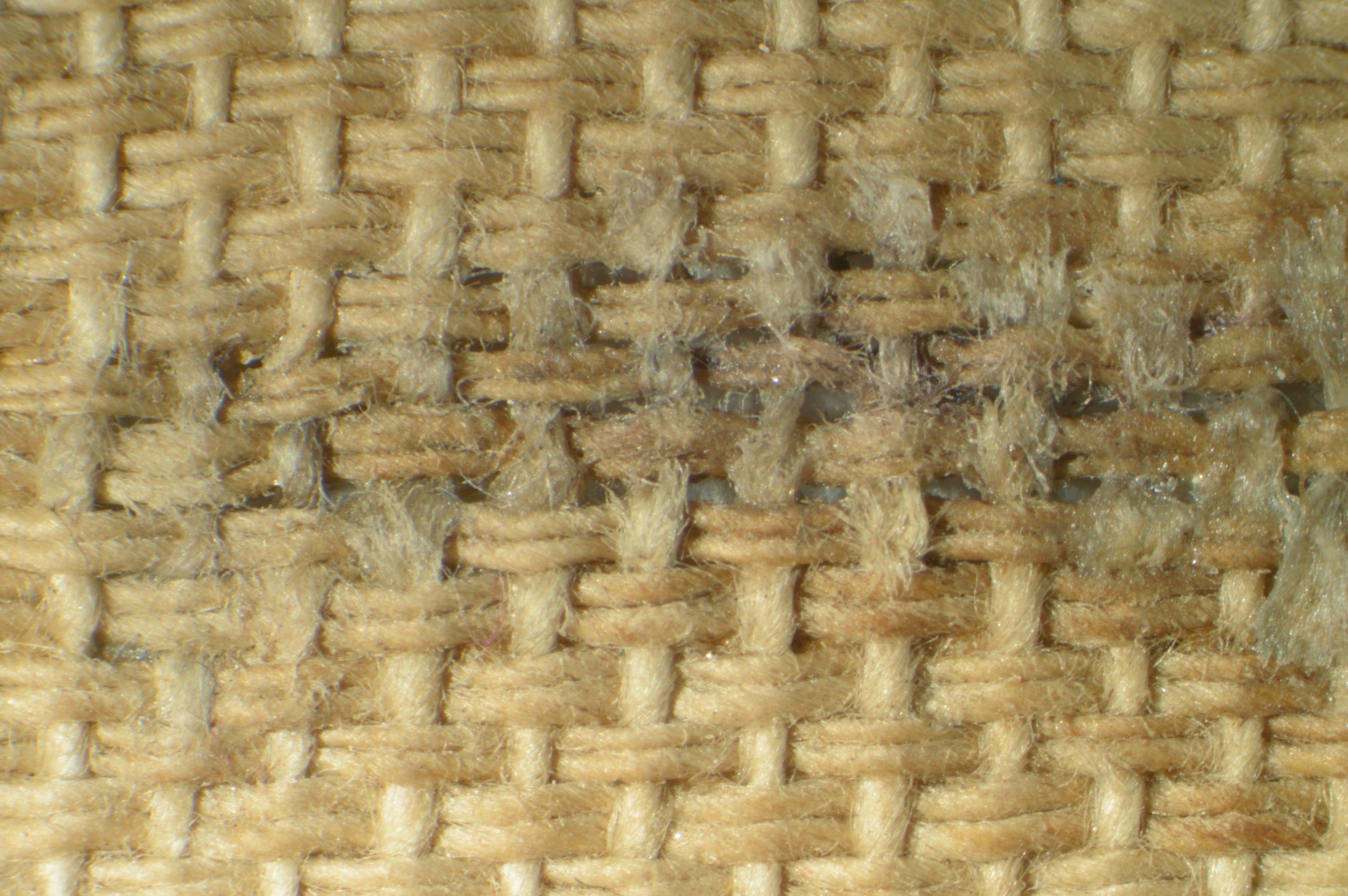 Repaired tear after reweaving 