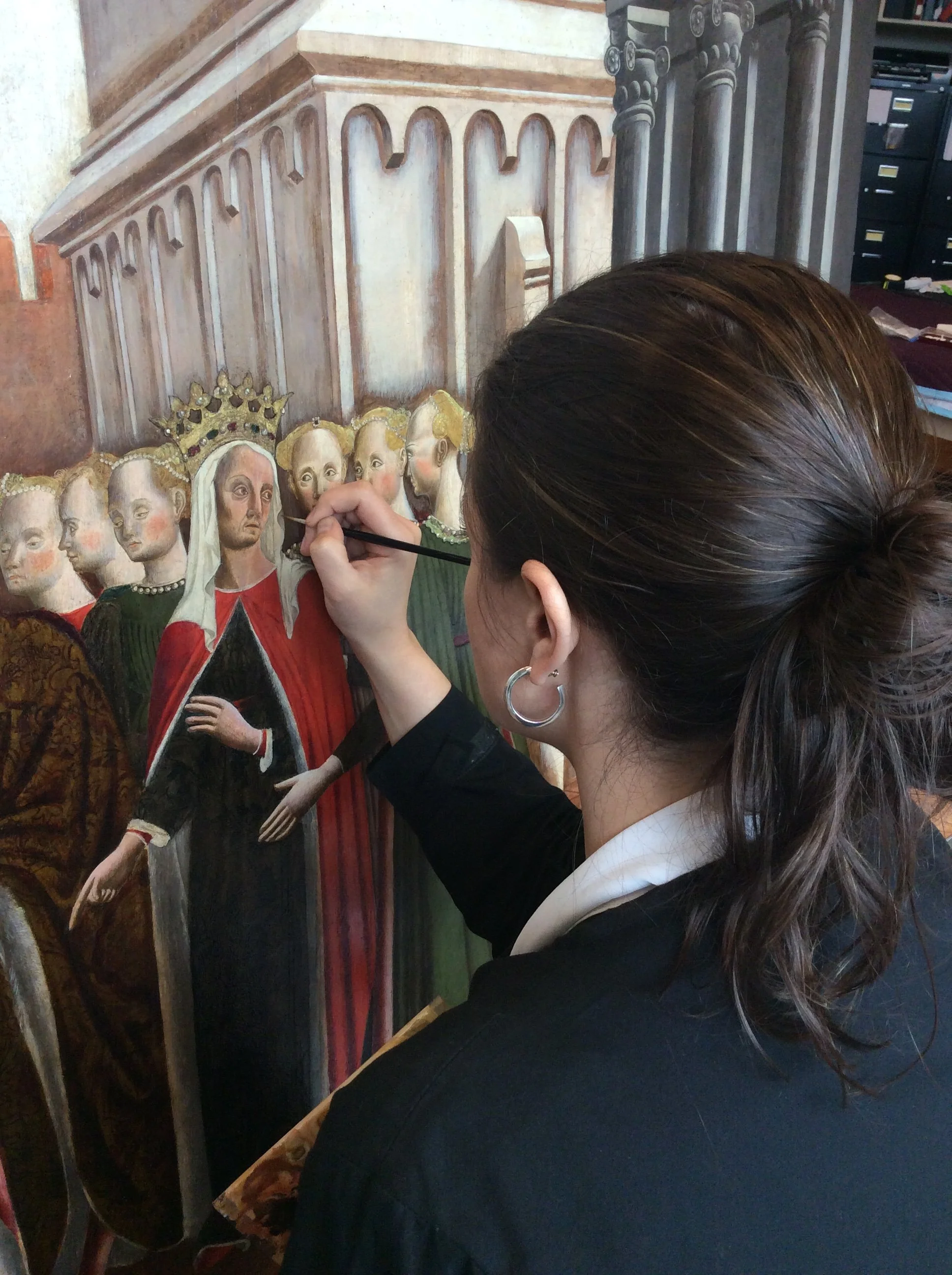 Inpainting areas of abrasion on a spalliera from 15th Century Italy - Image courtesy of Pam Betts