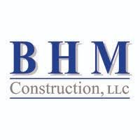 BHM Construction, LLC logo with blue text on a white background