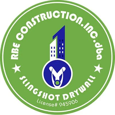 Logo with green background, white text, and a central emblem featuring a stylized human figure with outstretched arms inside a circle. The text reads 'RE Construction Inc., Joba, Inspection & Shot Drilling' with a license number 945906.