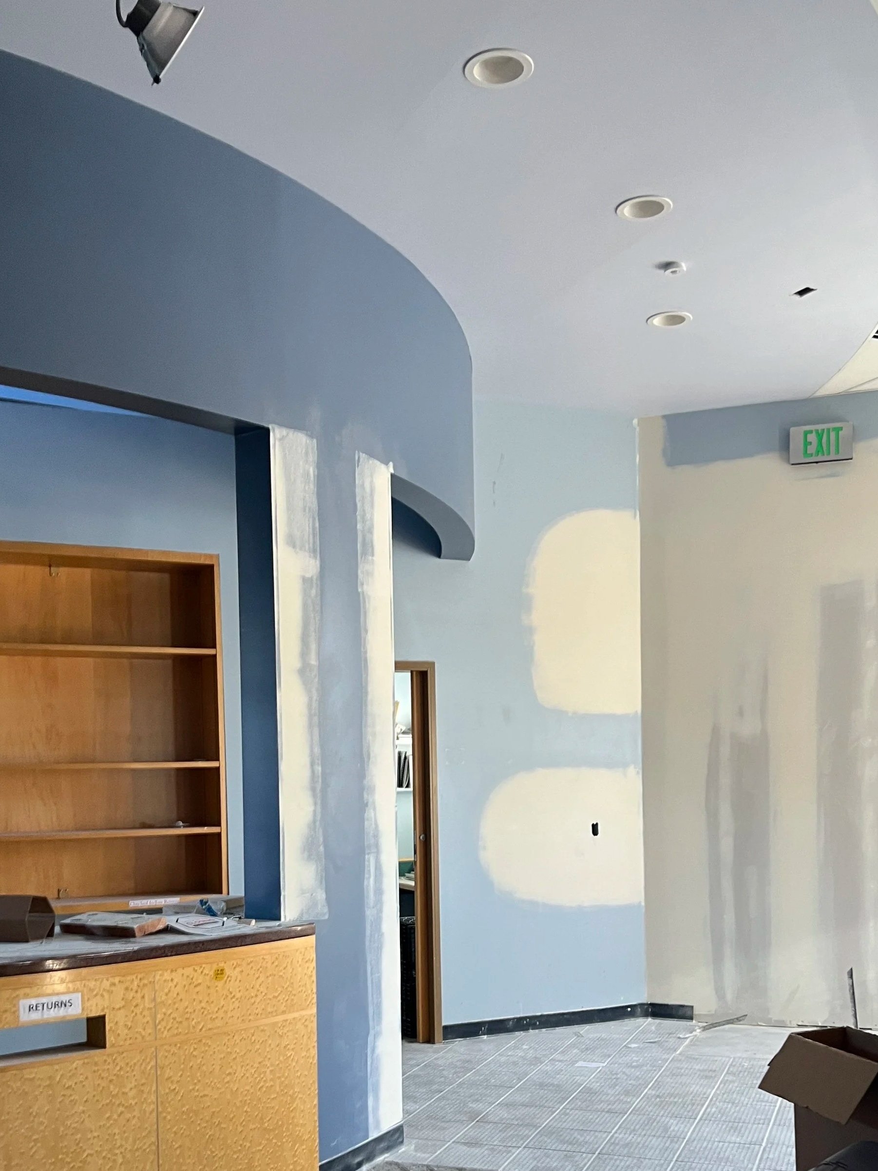 An indoor space of finished drywall