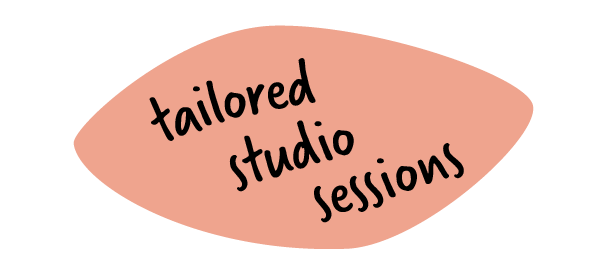 A pink speech bubble with black handwritten text that says 'tailored studio sessions'.