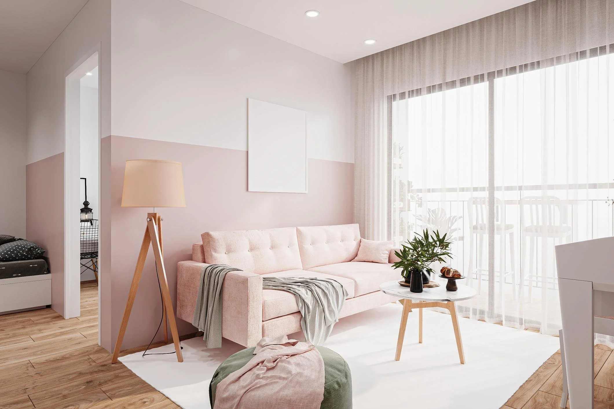 Bright living room with pink sofa, white round coffee table, and large window with sheer curtains.