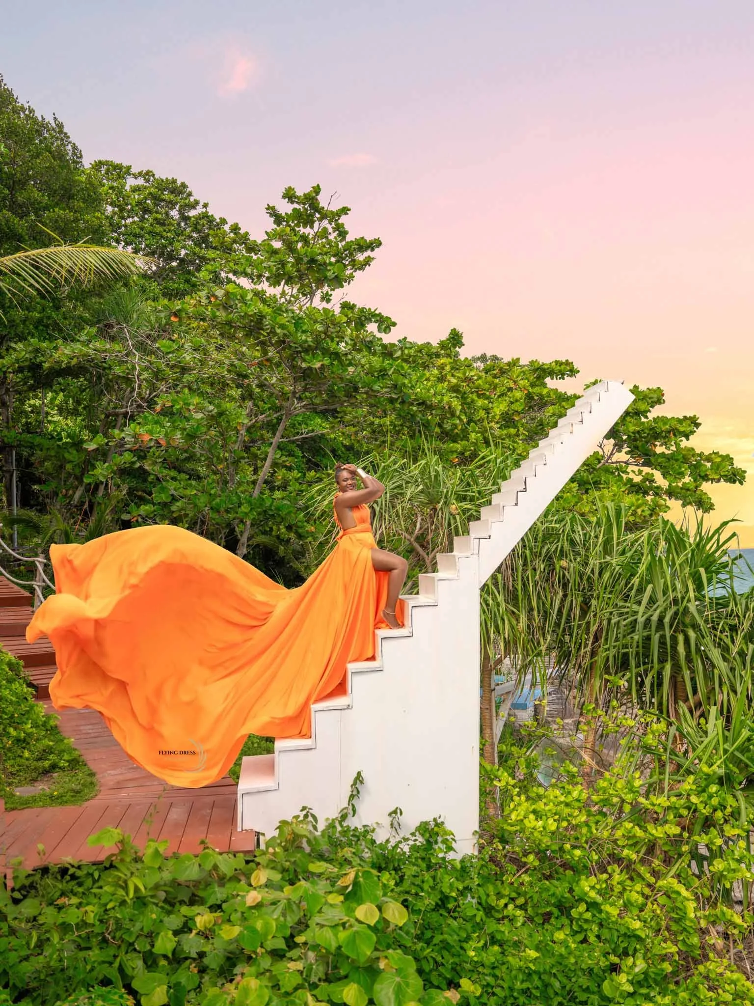 orange-flying-dress-floating-stairs-phuket.jpg