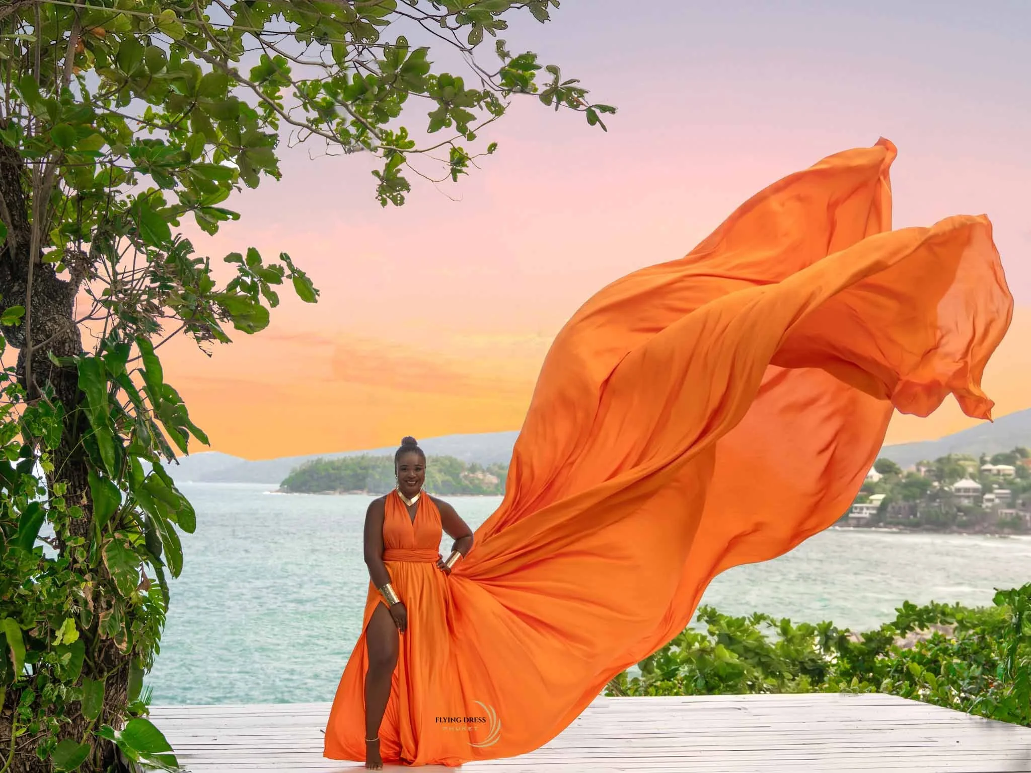 orange-flying-dress-sunset-ocean-phuket.jpg