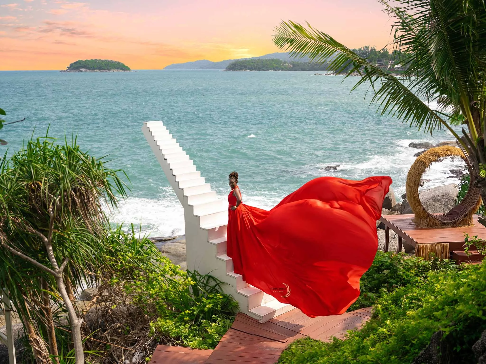 orange-flying-dress-seaside-staircase-phuket.jpg