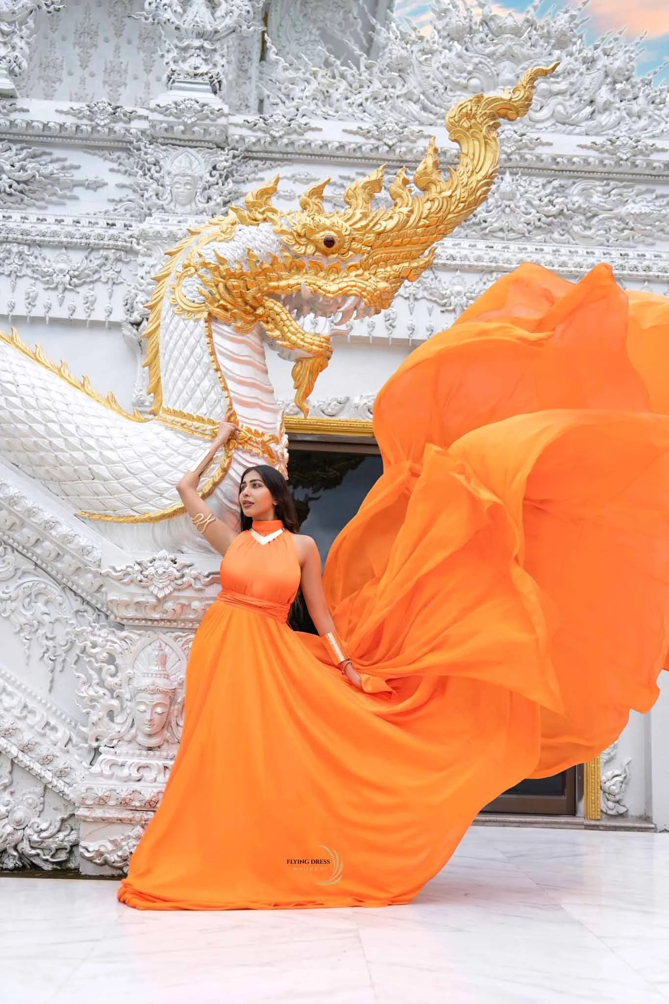 orange-flying-dress-temple-staircase-phuket.jpg