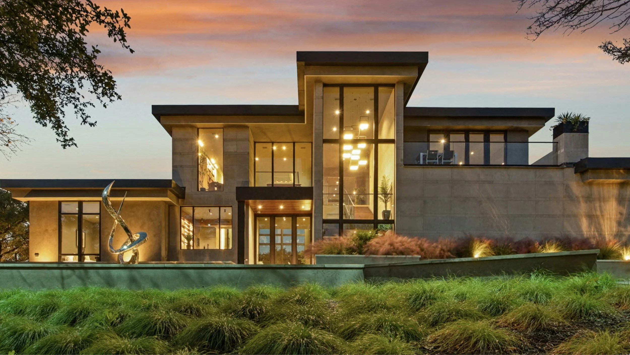 Modern residential property in New Orleans with large glass windows and warm interior lighting, representing design-driven real estate investment and renovation. Completing a value-add opportunity.