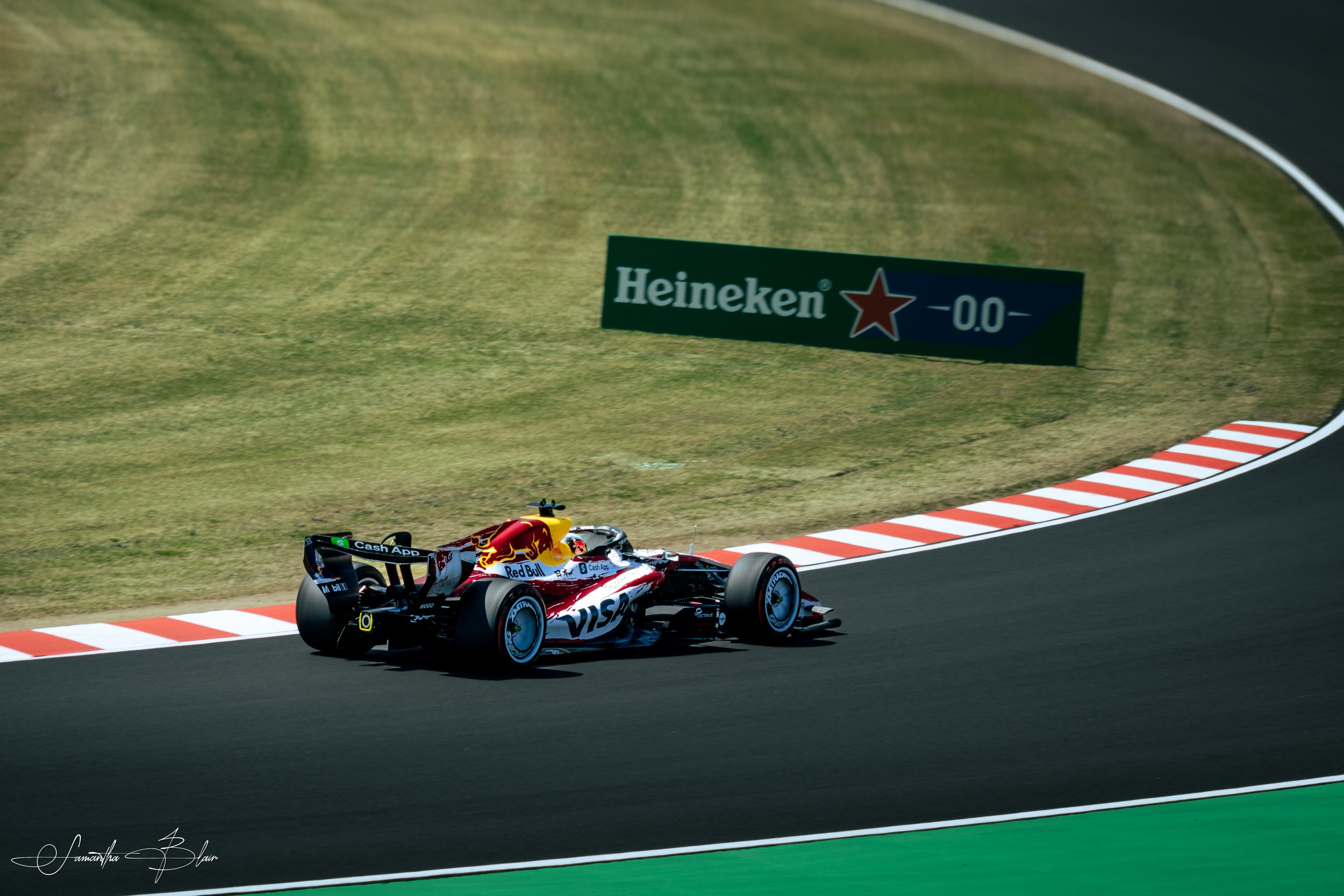 VCARB 2026 Formula 1 Car taking Suzuka's Spoon Curve, captured by Samantha Blair
