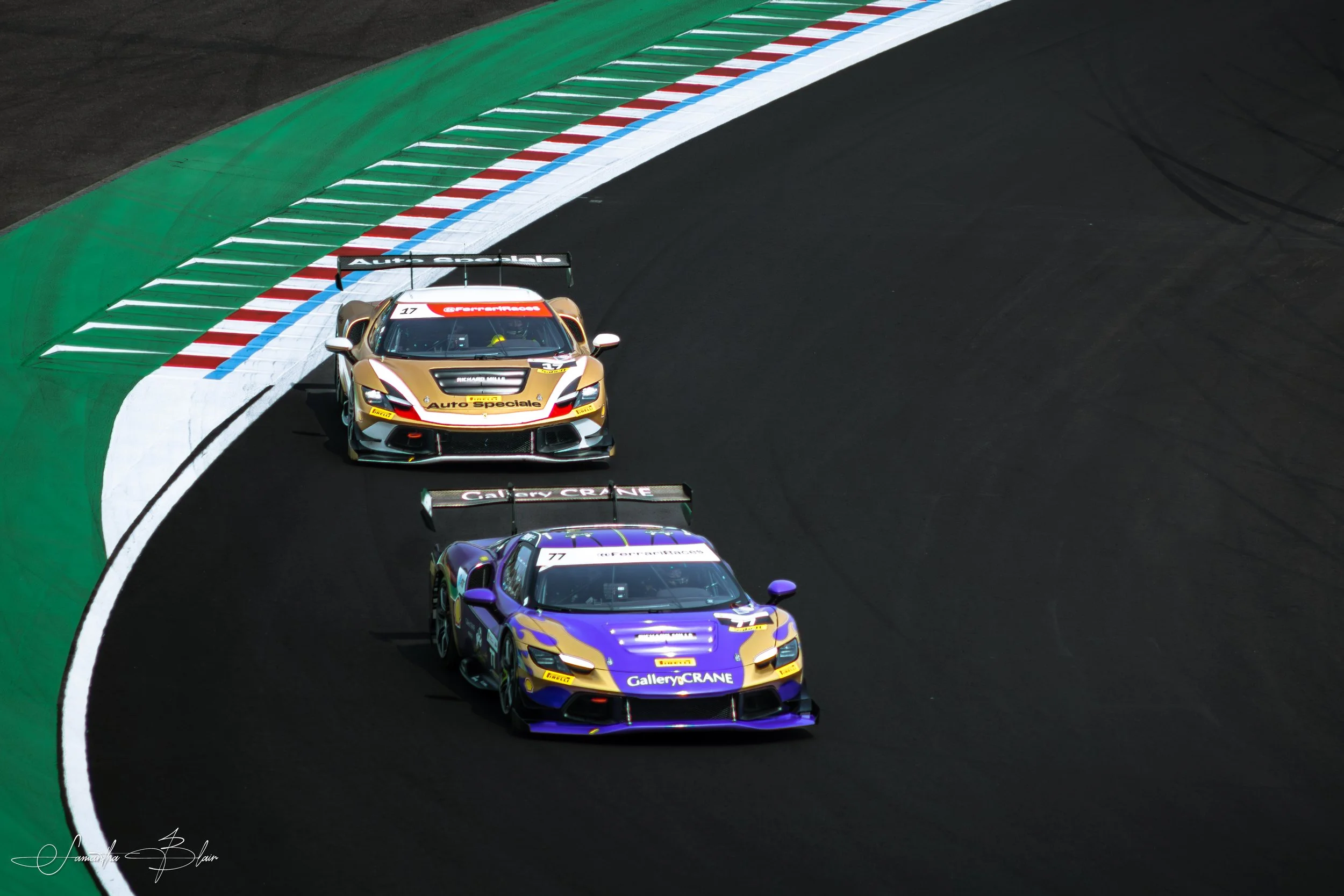Ferrari 296 GT3s taking Suzuka's Spoon Curve, captured by Samantha Blair