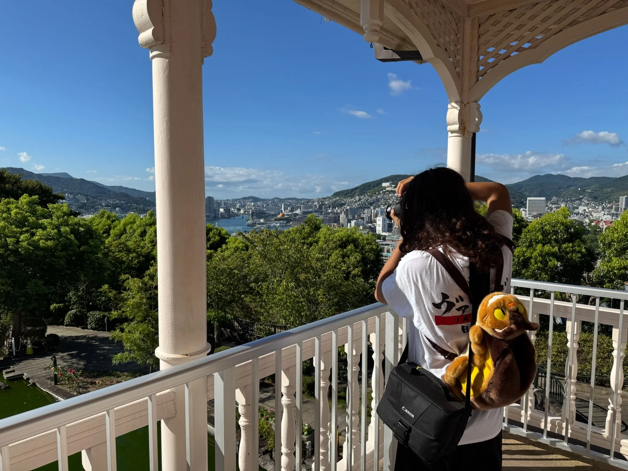 Samantha Blair, motorsports photographer based out of Northern Illinois, taking a photo of the mountains surrounding Nagasaki.