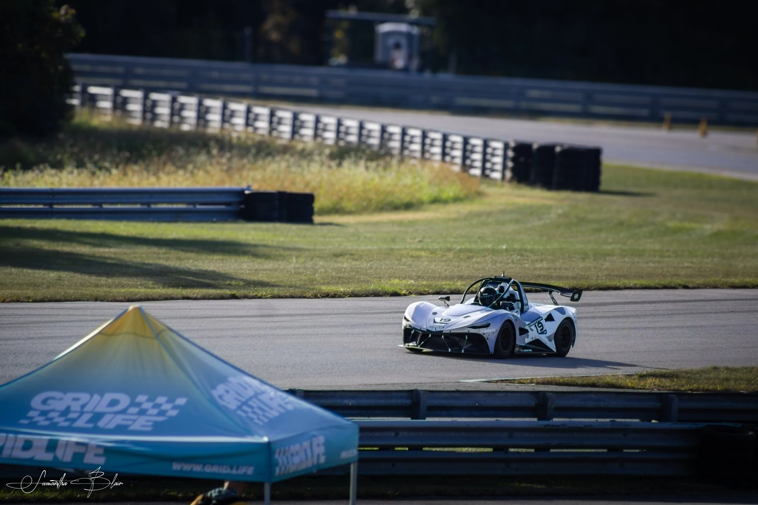 A Rush SR coming out of the final corner at Gridlife Chicago 2026, captured by Samantha Blair