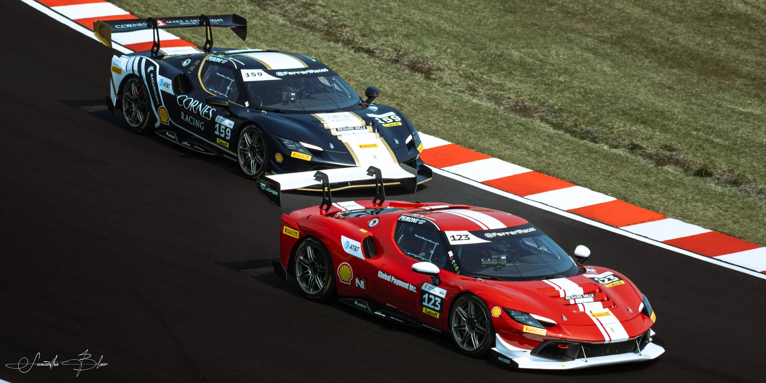 Ferrari 296 GT3s taking Suzuka's Spoon Curve, captured by Samantha Blair