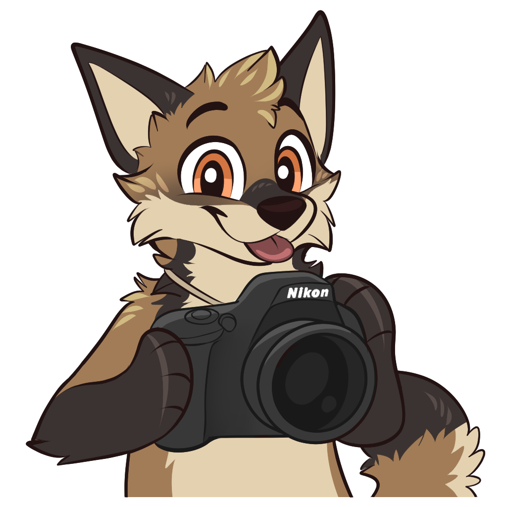 A coyote holding a Nikon camera, smiling with its tongue out.