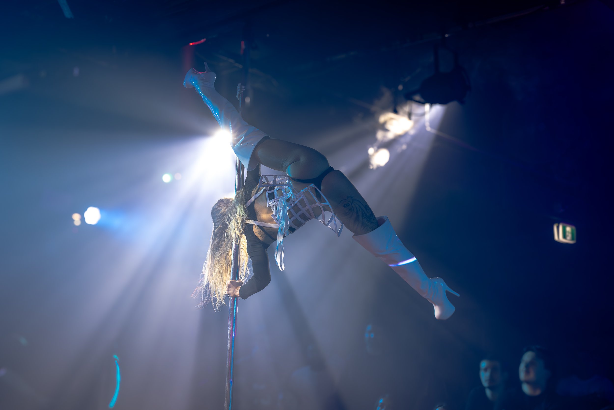 Aerial silks performer during a feature stage show at The Men's Gallery Melbourne strip club