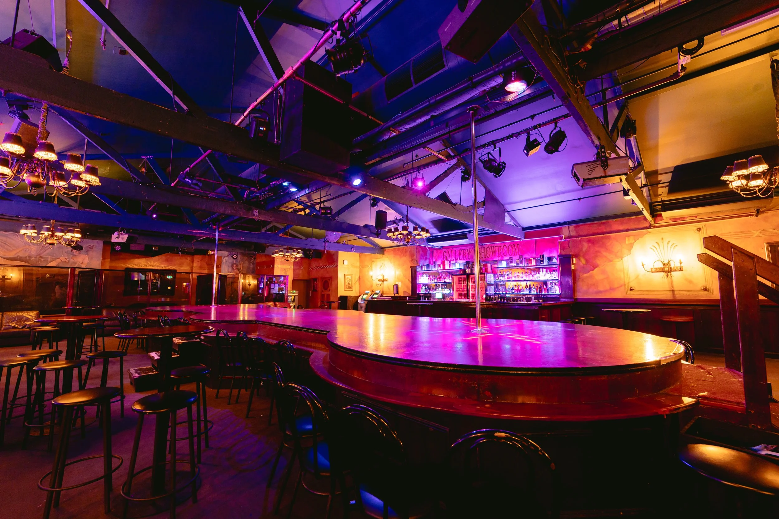 Round bar and stage area inside The Men's Gallery Melbourne strip club