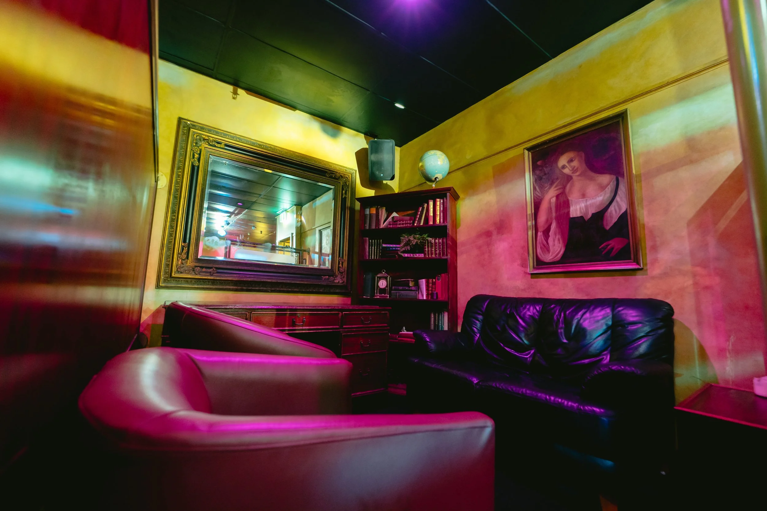 Cozy private lounge nook at The Men's Gallery Melbourne strip club