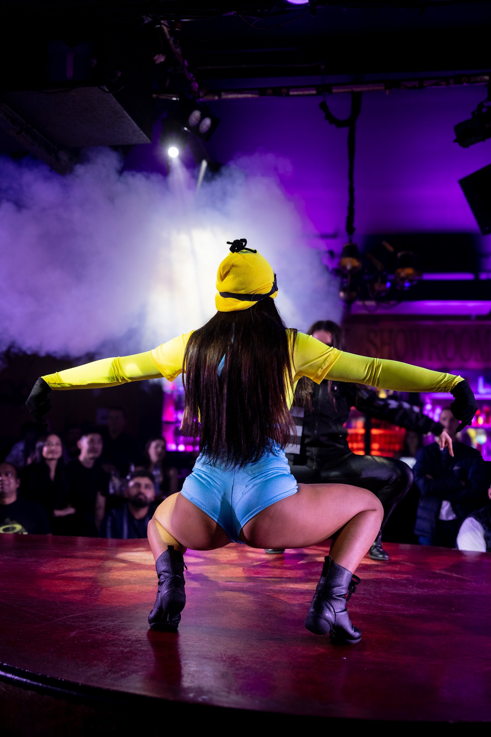 Themed banana costume stage performer during a comedy show at The Men's Gallery Melbourne strip club