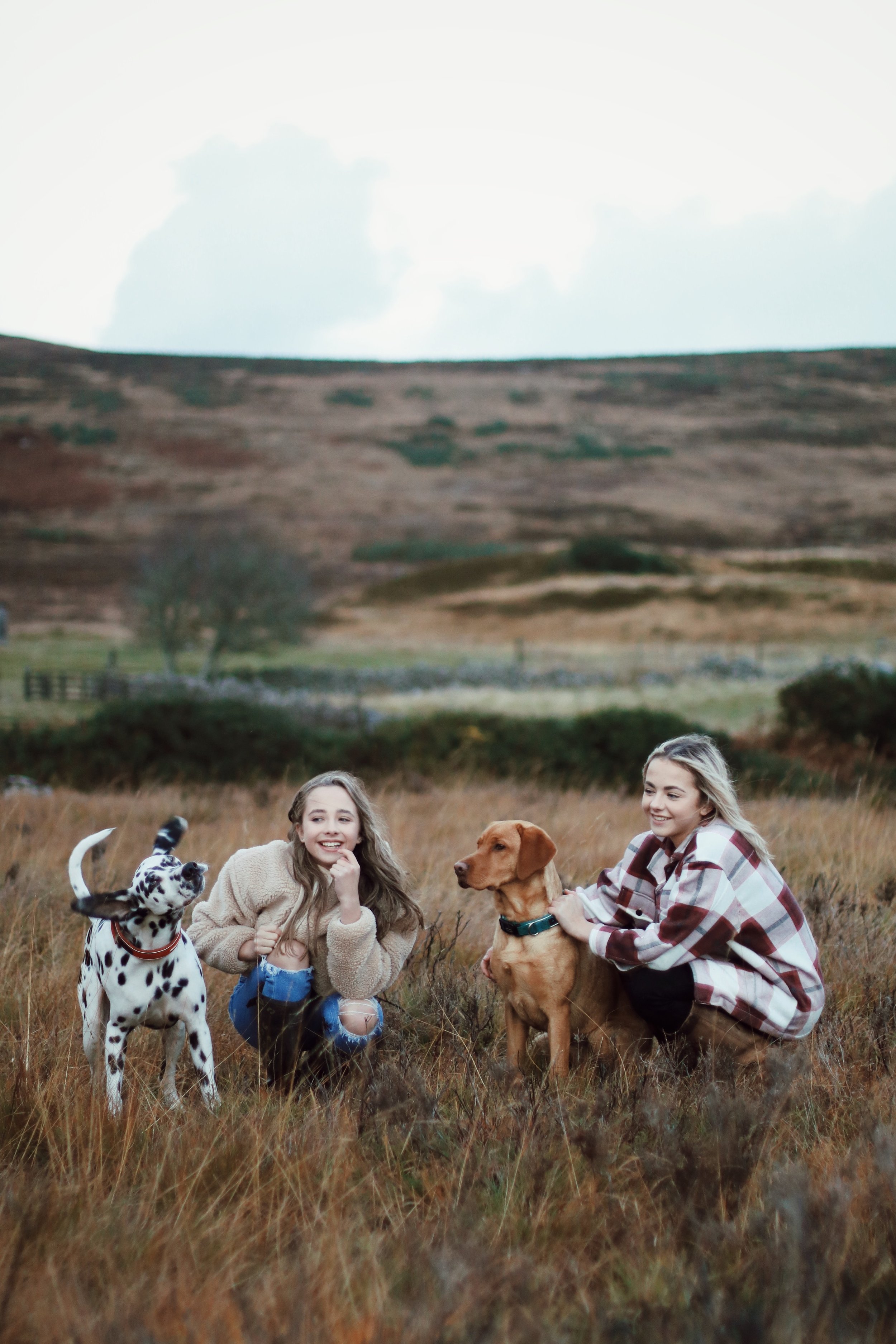 Outdoor family photography Scotland children with pets in Highlands landscape