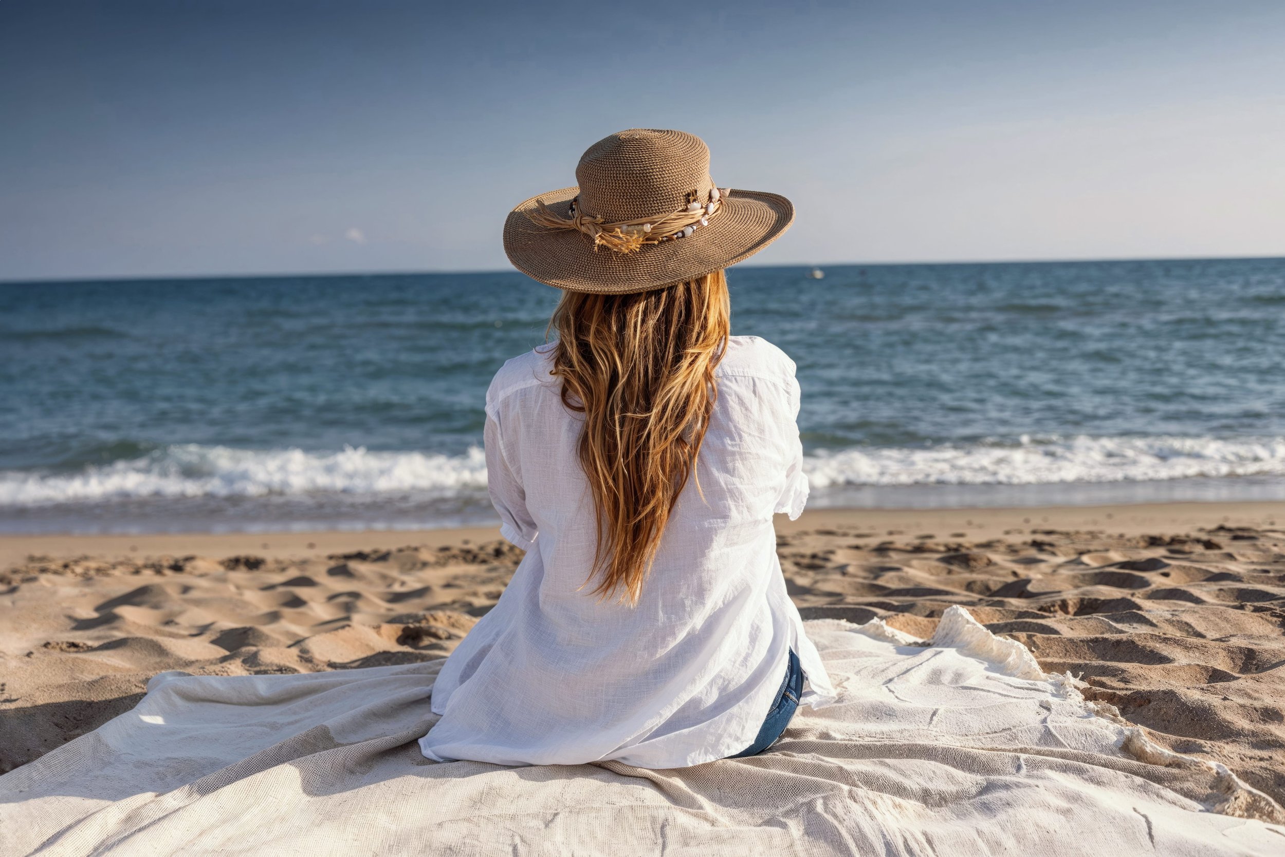 Why Summer Can Be Just as Tough on Your Hair as Winter